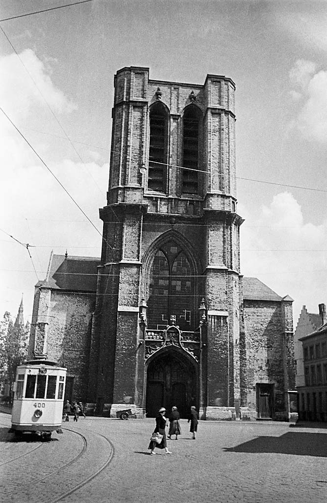 A tram at the church of St. Michael in Ghent