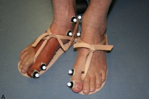 A volunteer in the study wears a replica of an ancient Egyptian prosthetic toe with imitation Egyptian sandals. Photo credit: Jacky Finch/University of Manchester