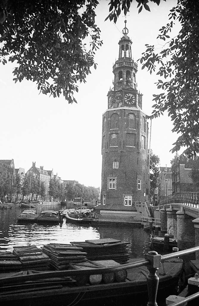 Montelbaanstoren at Oudeschans canal in Amsterdam. The original tower was built in 1516, as a defence tower