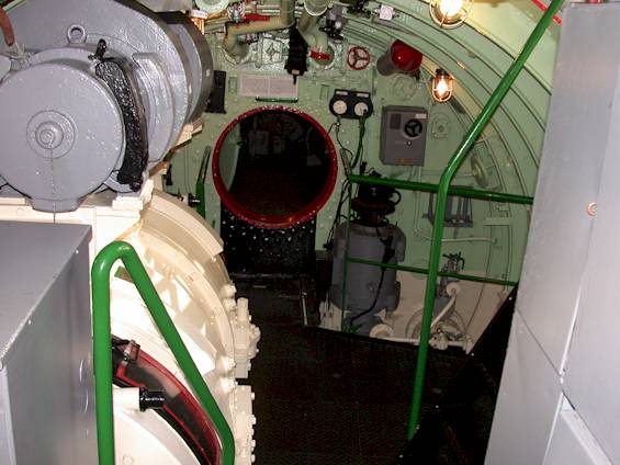View into elctrical engine room. The port engine has been removed to allow the visitors some movement, I can barely imagine how the crew moved around in here with both engines in place. source