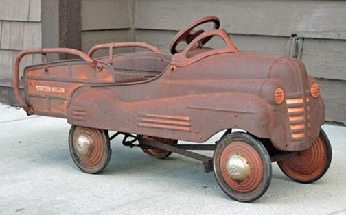 Love this old pedal car. source