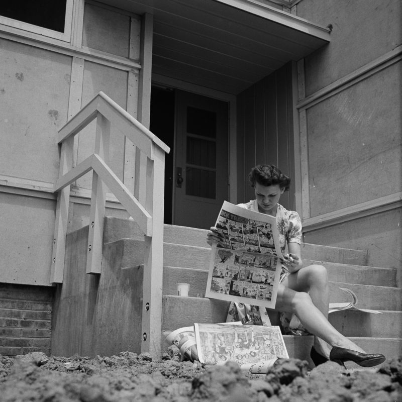 A-resident-reads-the-paper-outside-Idaho-Hall.