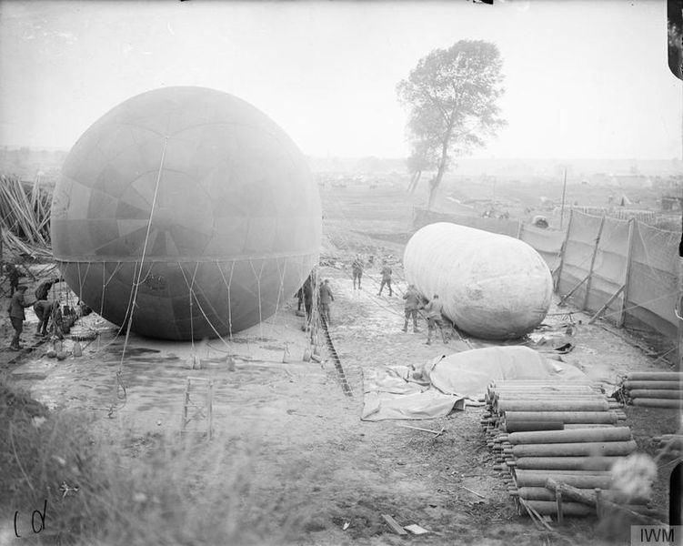 Air mechanics filling a Caquot kite balloon with gas from a nurse balloon. Near Meaulte, on the Bray-Albert road, 7th August 1916. source