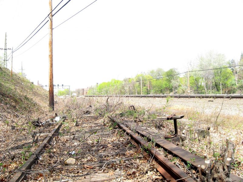 Looking northwest at abandoned southbound track.Source.