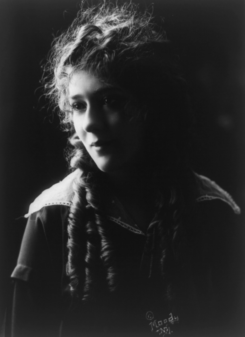 Mary Pickford, half-length portrait, facing left.Source
