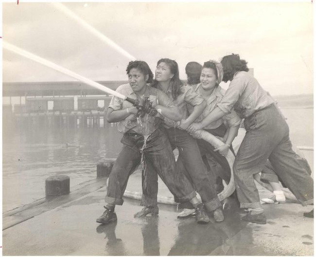 Volunteers learn how to fight fires at Pearl Harbor. [c. 1941 - 1945]