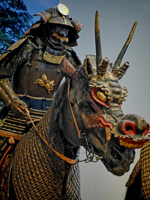Mounted Samurai wearing Tatehagidō Armor with a horse wearing a horned dragon mask Early Edo Period 17th century CE Japan.