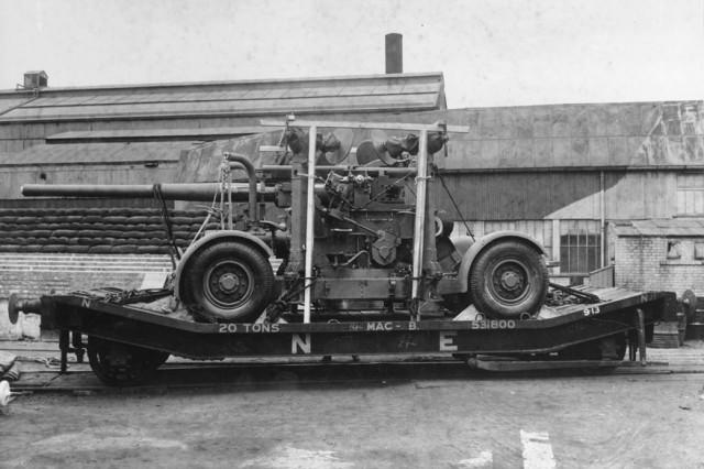 A 3.7” anti-aircraft gun on mobile mounting, ready for despatch outside 12 Shop.