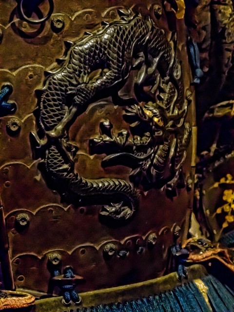Closeup of the shakudō cuirass depicting a coiled dragon of the Yokohagidō Armor 18th century CE Japan.