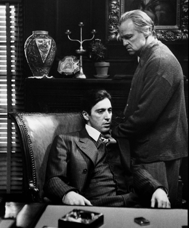 Al Pacino as Michael Corleone Marlon Brando as Vito Corleone