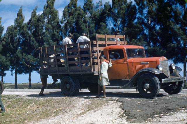 Workers board a truck in Mississippi.