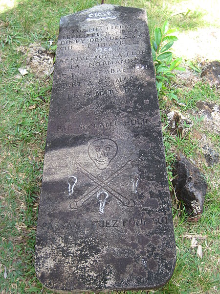 There are mostly graves from 1800s but only one with the classic skull and crossed bones. Source