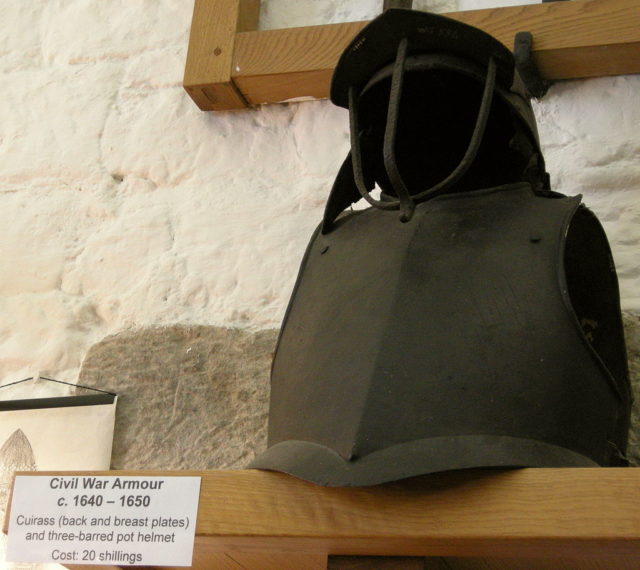 Cuirass and lobster-tailed pot helmet of the English Civil War (1642–1651), displayed at West Gate Towers and Museum, Canterbury, England. Source