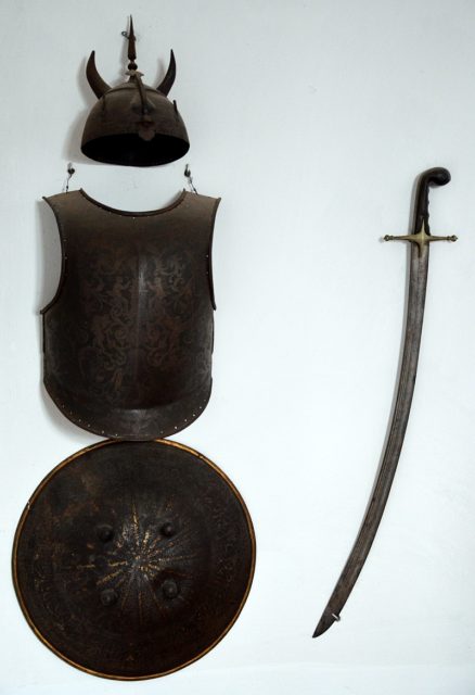 Indo-Persian Devil Mask, cuirass and scimitar Source