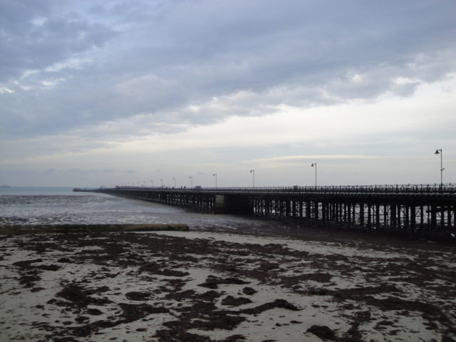 Ryde Pier, Ryde, Isle of Wight, seen at low tide. It is clearly visible here why a pier is necessary to operate a continuous Fastcat service from Ryde to Portsmouth.Source
