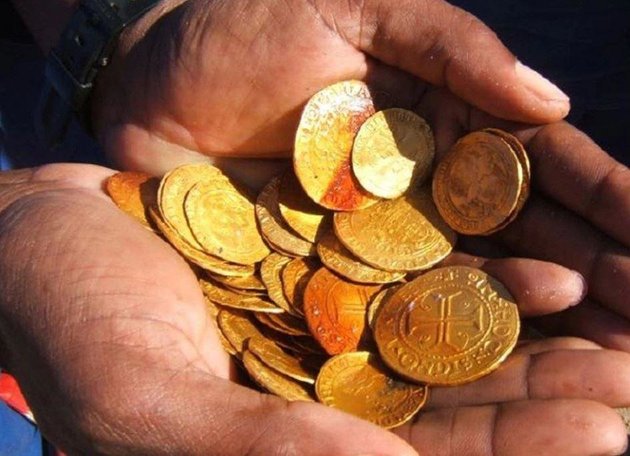 Some of the gold coins found amidst the wreckage of the ship - most of which are in mint condition. Dieter Noli