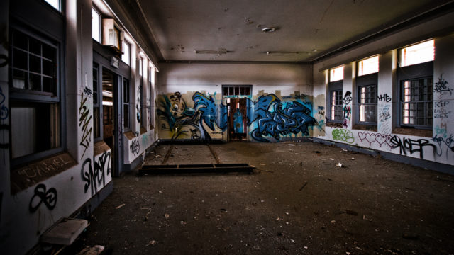 The interiors are intricately decorated with graffiti tags, on almost every surface. Source