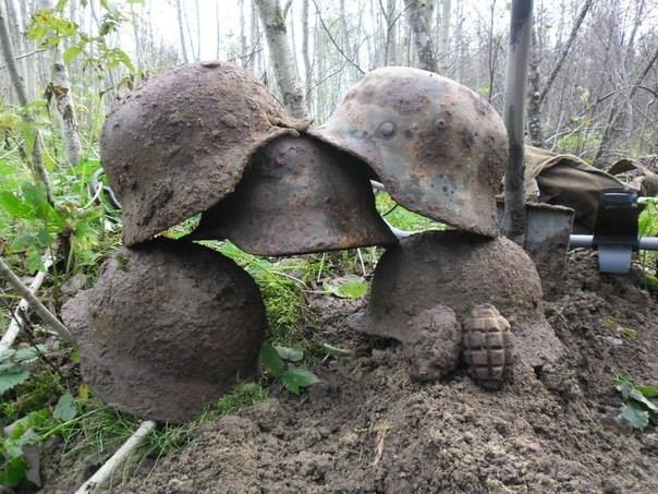 German helmets dug up on the Eastern Front. Photo credit: kurlandmilitaria.com 