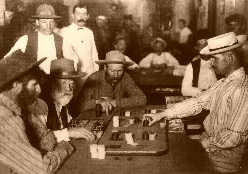 A faro game in an Tombstone, Arizona Territory saloon.Source