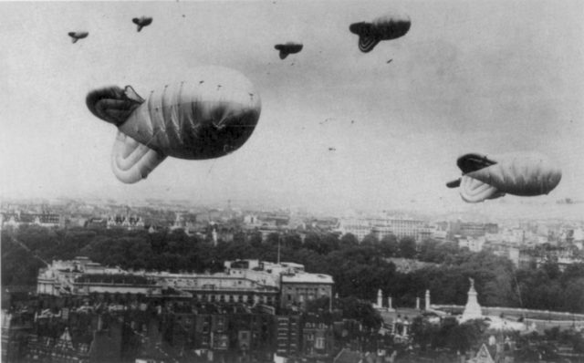 Barrage balloons flying over central London Source