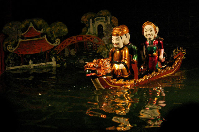 Hanoi Water Puppets - Legend of the restored sword King Le Loi on boat. Source
