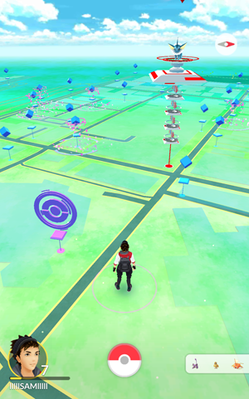 Players must physically travel to explore the game's map and visit PokéStops (the smaller circular (purple, visited) or cube (blue) icons, depending on proximity) and gyms (the one large tower shown).By Source (WP:NFCC#4), Fair use, https://en.wikipedia.org/w/index.php?curid=51078661