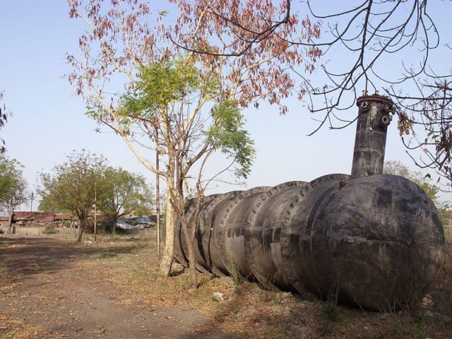 Tank 610 in 2010. During decontamination of the plant, tank 610 was removed from its foundation and left aside