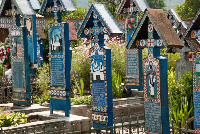 The Merry Cemetery crosses in pale blue color. Source