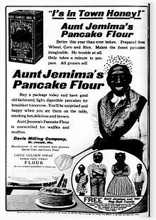 Ad showing the Aunt Jemima character with apron and kerchief as described, 1909. Wikipedia/Public Domain