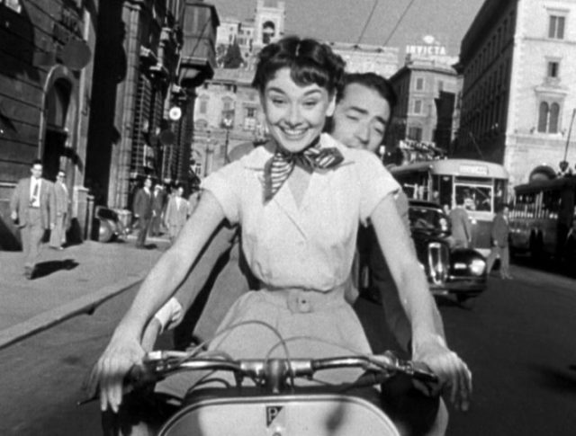 With Gregory Peck in Roman Holiday Photo Credit