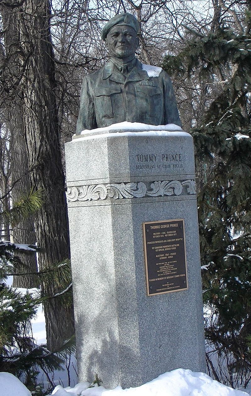 Monument to Tommy Prince, Kildonan Park, Winnipeg, just a few steps from the monument to his ancestor Peguis. Photo Credit