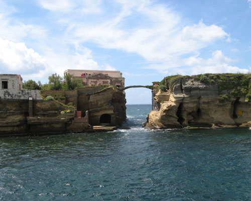 A small bridge connects the two islets, which are separated by just a few meters. Photo Credit