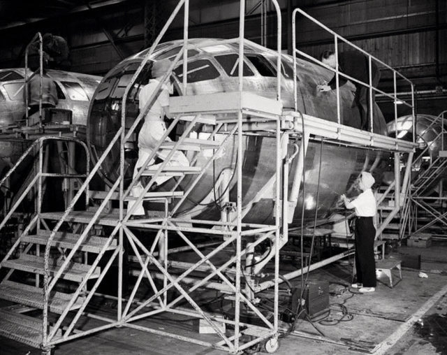 B-29 forward fuselages being riveted together
