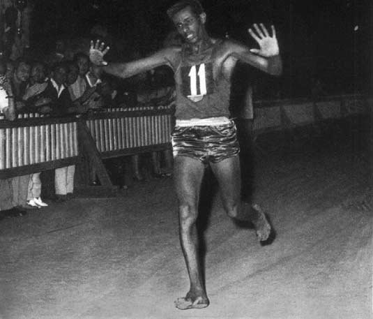 Bikila near the finish line at the 1960 Olympics. Wikipedia/Public Domain