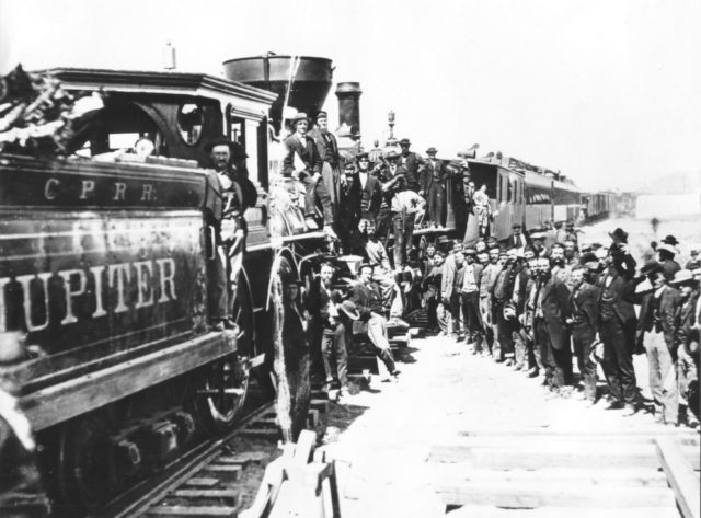 Celebration of completion of the Transcontinental Railroad, May 10, 1869, showing the name Jupiter on the side of the tender. Photo Credit