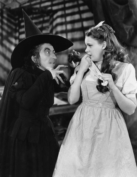 Hamilton as the Wicked Witch of the West with Judy Garland as Dorothy Gale in The Wizard of Oz (1939).