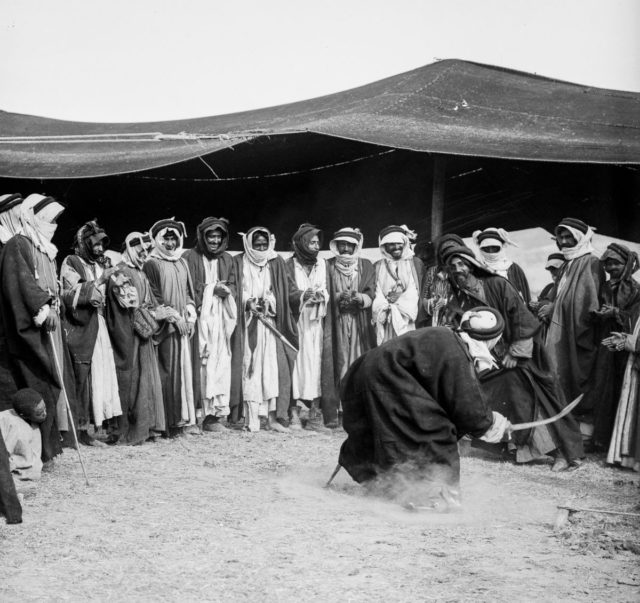 men-perform-a-sword-dance-at-a-wedding