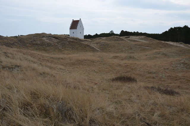 Rising levels of sand began to bury the foundations faster than they could be dug out. Photo Credit