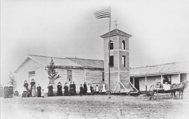 St. Peter’s Mission in 1884, after construction of quarters for the Uruslines. “Stagecoach” Mary Fields is sitting in the wagon at right.