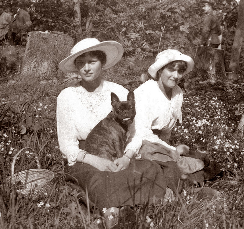 Grand Duchesses Tatiana and Anastasia and the dog Ortino in captivity at Tsarskoe Selo in the spring of 1917
