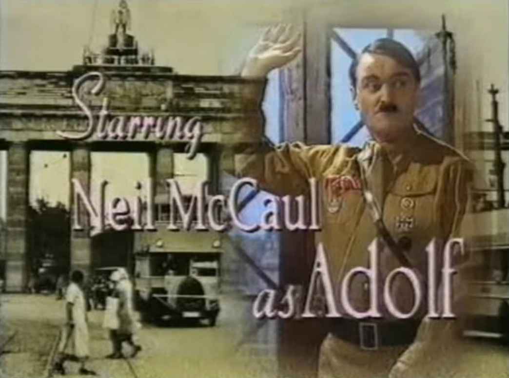 Neil McCaul as Adolf in "Heil Honney I'm Home Source: Youtube