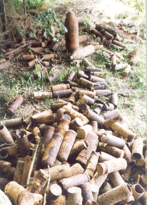 The ‘harvest of iron’. Shells are still recovered today and piled up ready for collection Photo Credit