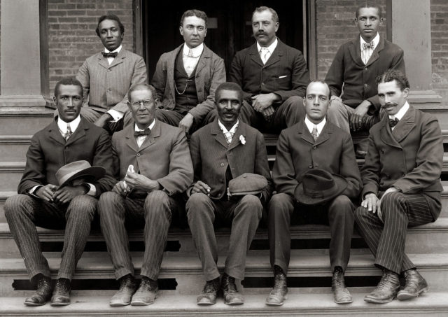 George Washington Carver (front row, center) poses with fellow faculty of Tuskegee Institute in this c. 1902 photograph taken by Frances Benjamin Johnston. 