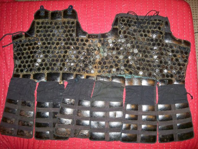 Edo period kikko tatami dō. A cuirass with small hexagon armor plates kikko. The kikko are connected to each other by chainmail and sewn to a cloth backing.