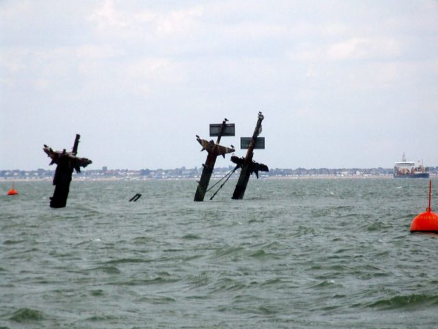 Visible masts of the wreck of Richard Montgomery Photo Credit