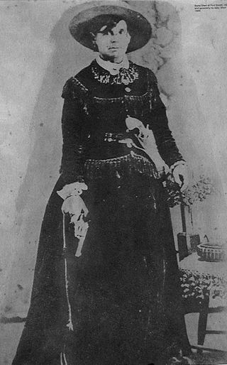 A studio portrait of Belle Starr probably taken in Fort Smith in the early 1880s. 