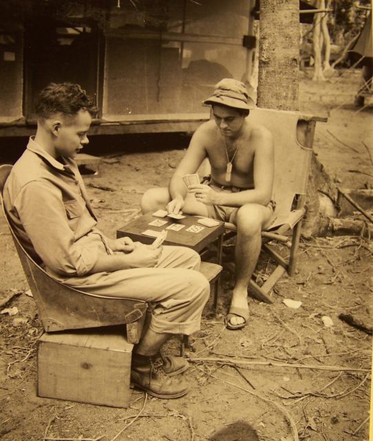 A dentist chair pulled straight from the cockpit and mounted to a frame. The drill is run by a 24-volt motor from a scrapped bomber, and the cuspidor is the propeller spinner cone from a fighter. Total genius. (NARA)