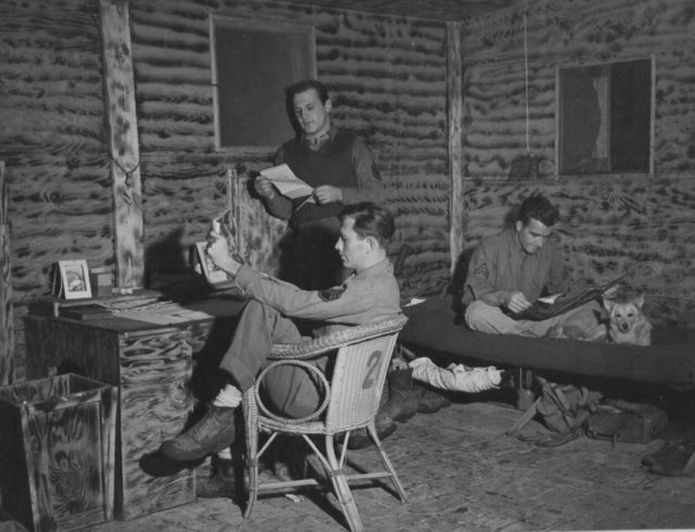 This bomber crew in Italy built a house from wooden crates salvaged from deliveries of drop tanks and unassembled aircraft. (NARA)