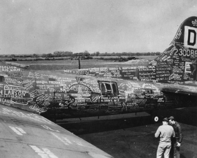 “SQUAWKIN’ HAWK” became the first B-17 of the 100th Group to fly 50 missions. With every square inch of her outer skin covered with names and autographs of men of the 100th, she was flown back to the U.S. to take part in a War Bond tour. 