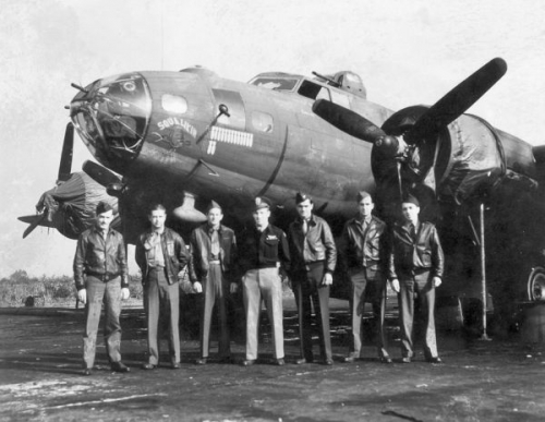 SQUAWKIN HAWK – October 1943 (left to right) S/Sgt. Charlie Ping-Tail Gunner, T/Sgt. Conner Brewster-Radio, S/Sgt. Francis “Frank” Dolsen-Ball Turret Gunner, Lt. Russell Engel-Navigator, Capt. Sumner Reeder-Pilot, S/Sgt. Robert M. Lovin-L/Waist Gunner, S/Sgt. Orrin Furlong-R/Waist Gunner. Courtesy of Frank Dolsen. via his Nephew, Michael L. Dolsen, Anchorage, Alaska. Frank still lives in Northville, MI…(8 Jan 2002) Most of crew gathered for a photo shot, just after Lt. Engle returned from the hospital) 